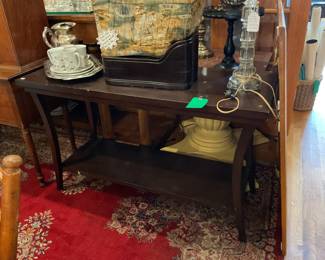 Dark wood entry way table with shelf 4’ x 18” x 29” $120 + tax