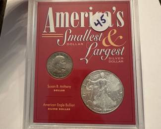 J33 - $45. America's Smallest Dollar (1979) & Largest Silver Dollar (1997).