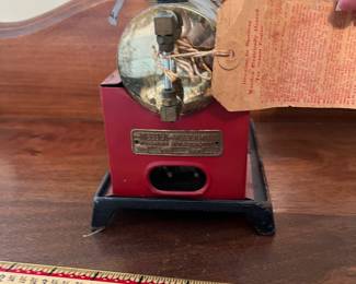 B36 - $80. 1930's Weeden Electric Steam Engine with original tag but NO cord. Measures 4.75" x 5.75" x 10" tall.