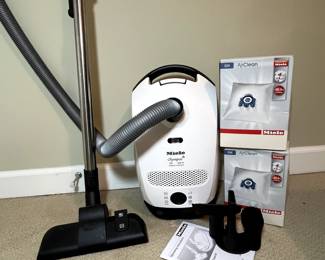 C35 - $300. Miele Olympus Vacuum with extra bags.