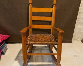 A23 - $45. Antique Childs Rocking Chair.