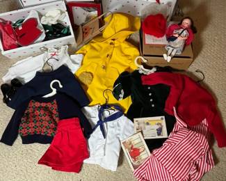 C21 - $550. American Girl Doll Molly McIntire - 1986. Pleasant Company Trunk. Outfits include Robe, Rain Slicker, Evergreen Velvet Dress, School Outfit, Plaid Dress, Striped Pajamas, Camp Outfit. Nurse doll in original box. Other shoes / accessories in drawers.