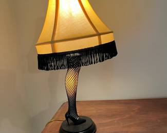 B34 - $25. A Christmas Story Leg Lamp. Measures 19" Tall.