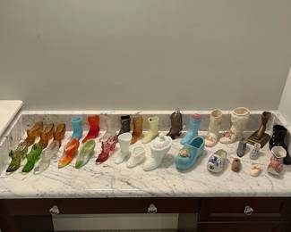 Overview of Fenton Glass Slippers and Boots. All Priced Individually