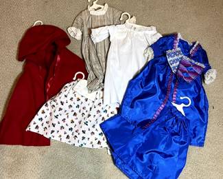 C23 - $450. American Girl Doll Felicity. Includes Christmas Gown & Stomacher, Spring Gown with Pinner Apron & Pompon, Felicity’s Summer Outfit, Cardinal Cloak, Nightgown, Cap & Mules, Work Gown, Riding Habit & Hat, Felicity’s Rose Garden Gown, Fashion Doll along with accessories. Trunk is NOT authentic pleasant company.