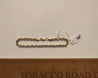 J6 - $350. 7.25" 14kt gold bracelet.