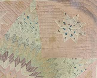 B11 - $40. Vintage "Lonestar" Quilt. Hand Pieced Hand Quilted. Measures 66.5" x 76.5" (Some staining. Please see photos)