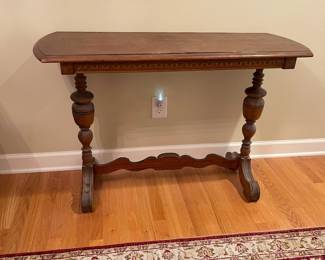 A58 - $40. Entry Table with heavy wear. Measures 45" long x 16.25" wide x 30" tall.
