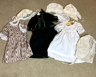 C23 - $450. American Girl Doll Felicity. Includes Christmas Gown & Stomacher, Spring Gown with Pinner Apron & Pompon, Felicity’s Summer Outfit, Cardinal Cloak, Nightgown, Cap & Mules, Work Gown, Riding Habit & Hat, Felicity’s Rose Garden Gown, Fashion Doll along with accessories. Trunk is NOT authentic pleasant company.