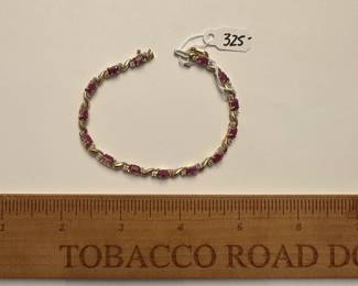 J1 - $325. 10kt gold 7" tennis bracelet