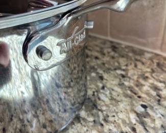 K5 - $50. All-Clad D5 2 Qt. Soup Pot . Measures 4.5" tall.
