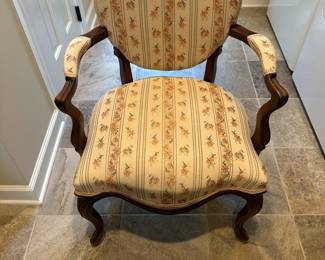 L5 - $60. Single Antique Upholstered Chair. Measures 24.5" wide x 24" deep x 38" tall. Feels like it has the original springs in it.