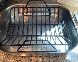 K12 - $50. All-Clad Stainless Roasting Pan with Rack. 17.5" long x 14" wide x 5" tall (with handles)