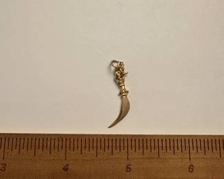 J16 - $75. 14kt gold charm.
