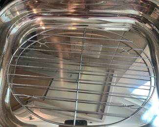 K13 - $40. All-Clad Stainless Roasting Pan (rack not included). 18" long with handles x 12" wide x 2.25" tall.