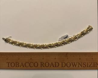 J8 - $700. 7.75" 14kt gold Bracelet.
