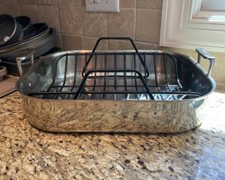 K12 - $50. All-Clad Stainless Roasting Pan with Rack. 17.5" long x 14" wide x 5" tall (with handles)