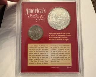 J33 - $45. America's Smallest Dollar (1979) & Largest Silver Dollar (1997).