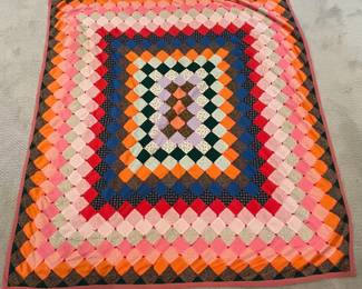 B7 - $50. Vintage "Trip Around the World" Quilt. Measures 71" x 77".