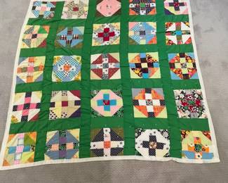 B6 - $40. Vintage "Cross Current" Quilt. Minor holes in some of the old fabric. Measures 75" x 76".