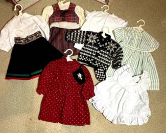 C24 - $400. American Girl Doll Kirsten 1986, Kirstens Doll
Outfits include -
Blue Calico Dress
School Dress & Shawl
Apron Dress & Daisy Wreath
Friendship Quilt & Quilt Kit
Summer Dress & Straw Hat
Red Boots
Winter Skirt & Blouse
Hand-Knit Woolens
Flannel Underwear
Kirsten’s Nightgown
Swedish Dirndl & Kerchief
Spoon bag, spoon, hankie
Trunk is *NOT* authentic Pleasant Company but included!