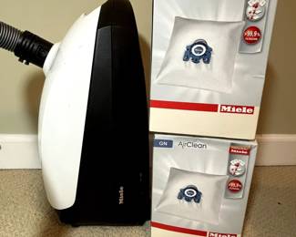 C35 - $300. Miele Olympus Vacuum with extra bags.
