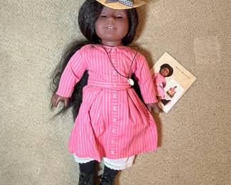 C19 - $400. Addy Walker - American Girl Doll 1993. Includes doll, Ida Bean, 6 outfits, kerosene lantern, gourd, half dime, apron (new in package). Hair has been brushed a lot but no issues noted with the doll. Not photographed but also includes straw hat.