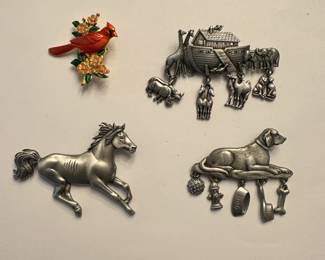 J26 - $30. Set of 4 "JJ" Brooches.