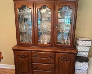 A35 - $100. Kincaid Lighted China Cabinet. Measures 60" wide x 18" deep x 80" tall. (Base alone is 35") Glass Shelves are adjustable!