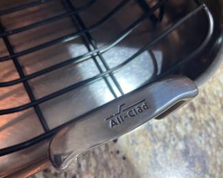 K12 - $50. All-Clad Stainless Roasting Pan with Rack. 17.5" long x 14" wide x 5" tall (with handles)