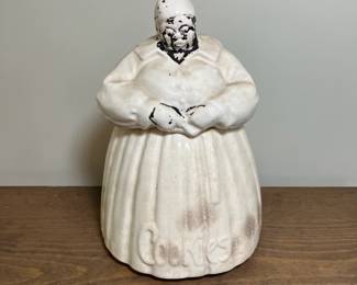 C40 - $125. McCoy Cookie Jar - has lost most of it's original coloring and does have crazing. No chips/cracks noted.