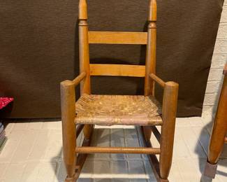 A22 - $40. Antique Childs Rocking Chair.