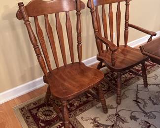 A33 - $250. Kincaid Dining Room Table. Solid Wood Furniture. Includes 2 Captains Chairs & 6 Regular Chairs. Measures 42" wide x 68" long. 2 - 12" leaves. HEAVY duty set. Includes table pads. Overall in very good vintage condition! Very minor signs of use. Photos show the leaves IN the table.