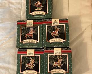 C1 - $25. Hallmark Santa Sleigh and 8 Reindeer Ornament Set