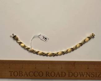 J10 - $775. 7" 14kt gold bracelet.