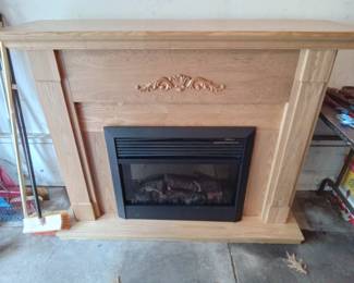 Electric Fire Place including large mantle.