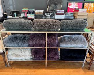 Sheepskin and Tibetan lamb pillows - all natural. Console not for sale.