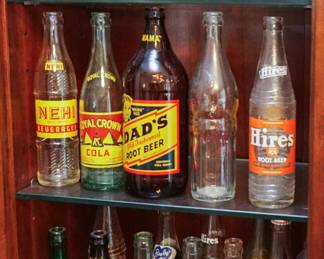 Vintage root beer bottles and glasses