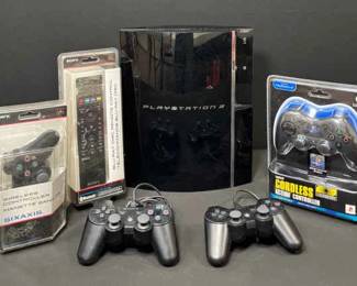 Preowned Sony PlayStation 3 console with a variety of accessories