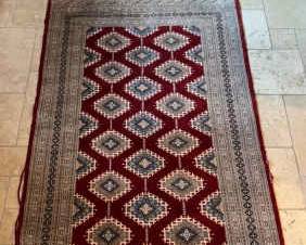 Two HandKnotted Wool Rugs in Red and Cream