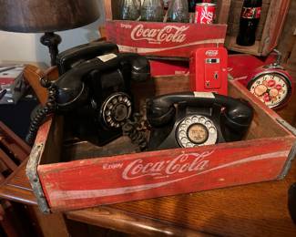 Old Coca Cola, several old telephones
