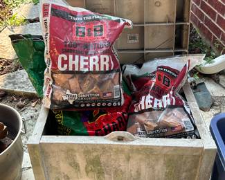 Lots of hardwood smoking wood and pellets