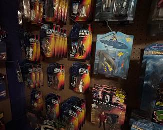 Star Wars Action Figures - all upstairs displayed on peg boards.
