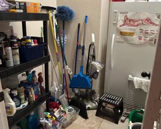 Stocked utility/laundry room. Deep freeze! Cleaning tools and supplies.