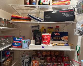 Some canned good, kitchen tools and food storage