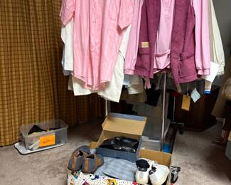 Men's clothing and slacks and shoes. And women's on one side of rack