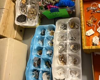 Vintage costume jewelry including many brooches