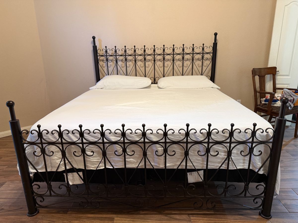 One of a kind, custom made king size iron bed.  Made by Catrina’s at the Ranch in Boerne, TX. 