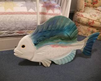 Large wooden fish sculpture