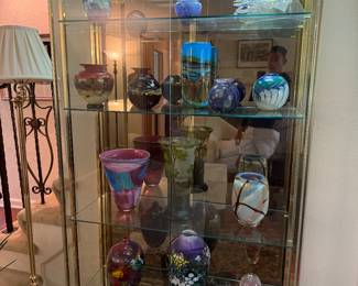 a glass Eterge cabinet. 